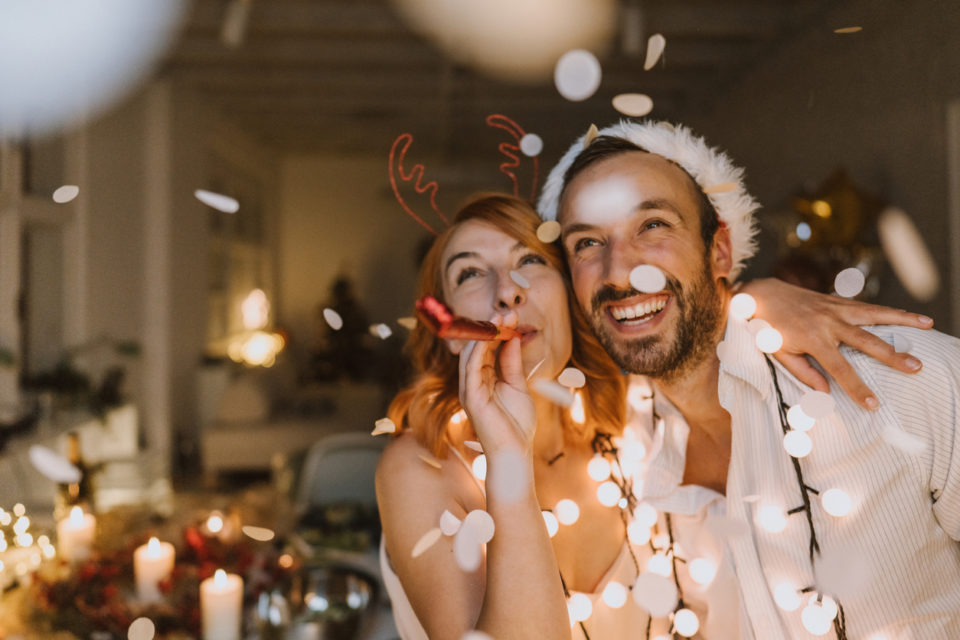 Photo of young couple on Christmas Eve