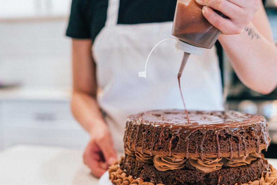 cake baker decorating cake