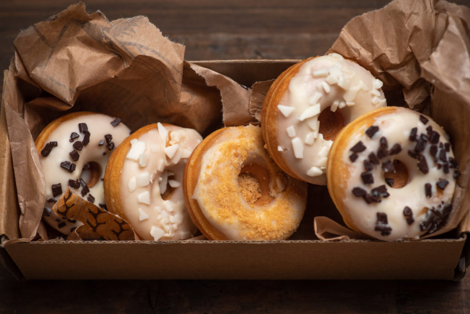 White glazed mini donut in a box