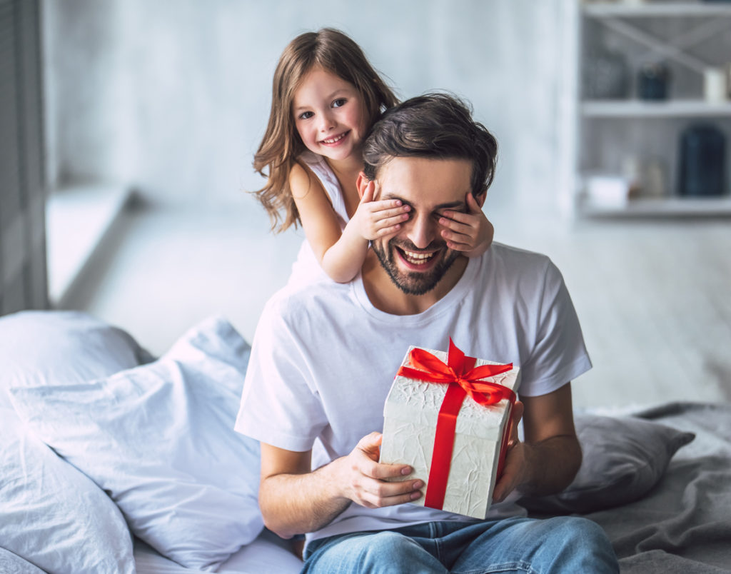 Dad with daughter at home